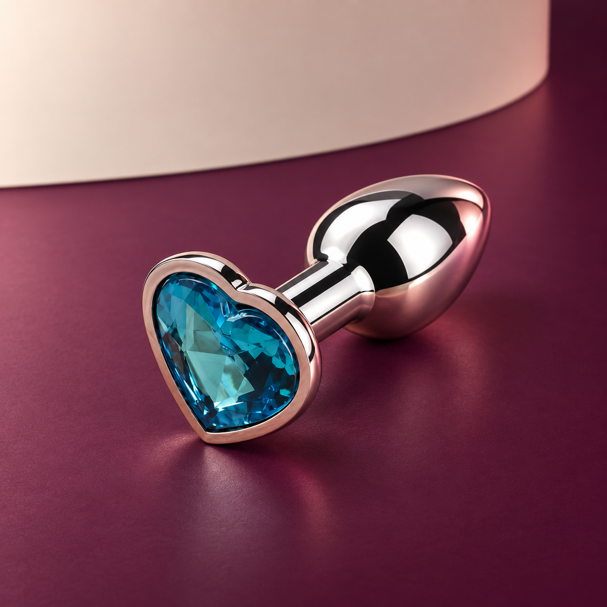 Gemstone-base mini metal plug — blue heart base, alternate KINKZA studio angle