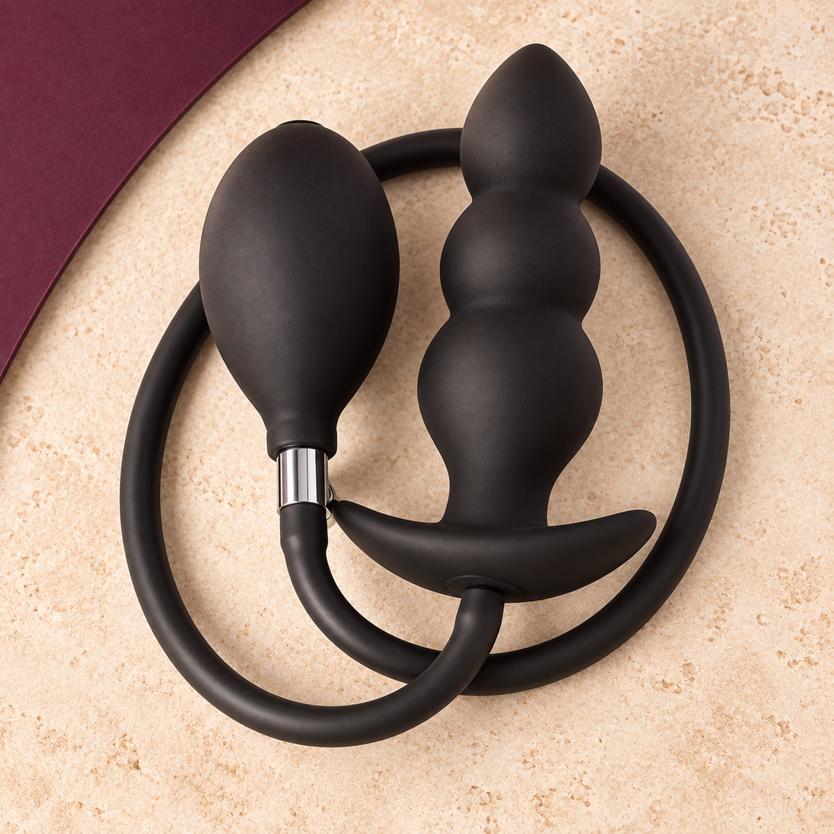 Black inflatable plug and pump kit — KINKZA top-down ivory product view